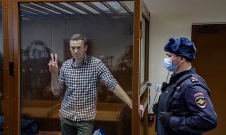 Alexei Navalny inside a glass cage