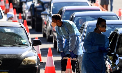 People queue in their cars for a Covid PCR test at Rose Bay in Sydney