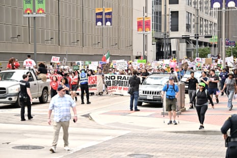 Demonstrators take part in the No Kings Houston Protest, TX on March 28, 2026 in Houston, Texas.