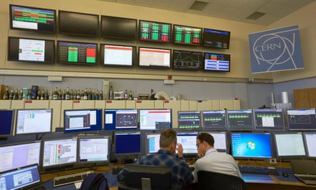 Technicians work in the Control Centre of the LHC