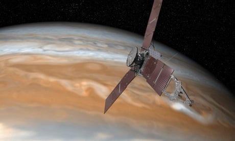 Nasa spacecraft Juno skims Jupiter's clouds in record-breaking mission
