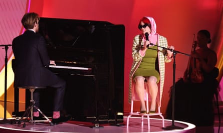 Billie Eilish wearing a replica of Barbie’s ‘poodle parade’ outfit when she performed with Finneas O’Connell at the Grammy awards