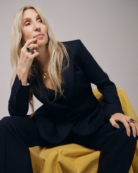 ‘Walking in step with Amy Winehouse ‘sucked me to a place I didn’t understand how to get back out of’. Taylor-Johnson wears navy pinstripe suit, bellafreud.com; gold long chain, ateliervm.com; gold pendant, alighieri.com. Other jewellery, Taylor-Johnson’s own.