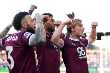 Zian Flemming of Burnley celebrates scoring his team's first goal with teammates.
