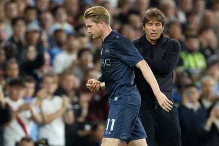Kevin De Bruyne trudges past Antonio Conte