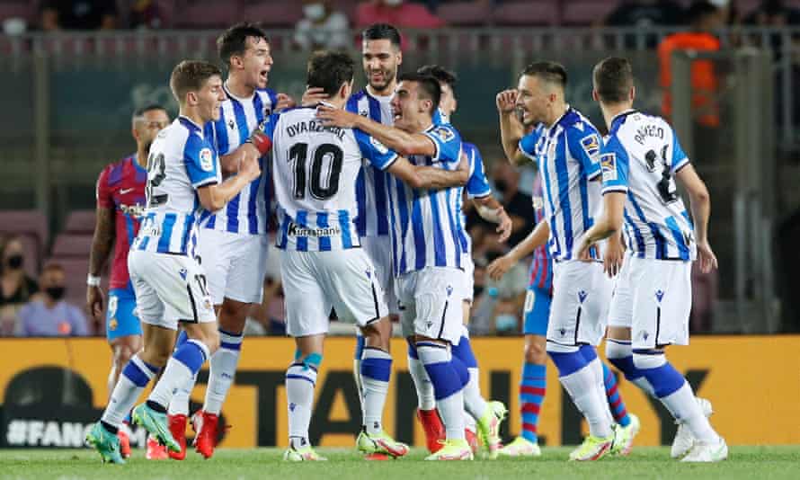 Real Sociedad’s Mikel Oyarzabal celebrates scoring their second goal with teammates
