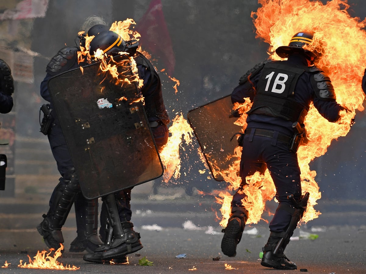May Day in France: six police injured as violent group hijacks Paris march | France | The Guardian