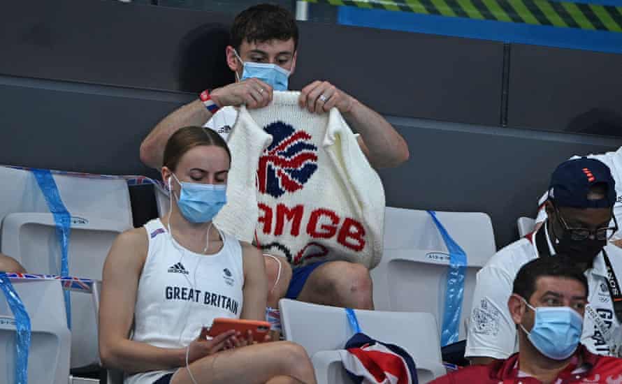 Tom Daley with one of his knits at a Tokyo 2020 diving event