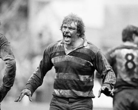 Roger Spurrell covered in mud, shouting