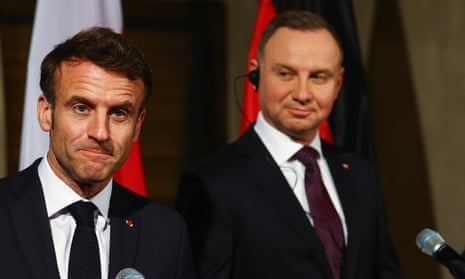 French president Emmanuel Macron and Polish president Andrzej Duda speak to reporters.