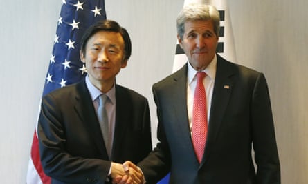 US secretary of state John Kerry, right, and South Korea’s foreign minister Yun Byung-se shake hands during a meeting in Munich.