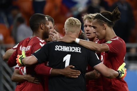The Danish players celebrate at the final whistle.