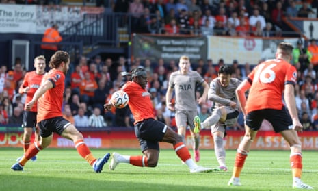 Son Heung-min shoots for goal as Tottenham pile on the pressure early in the game.