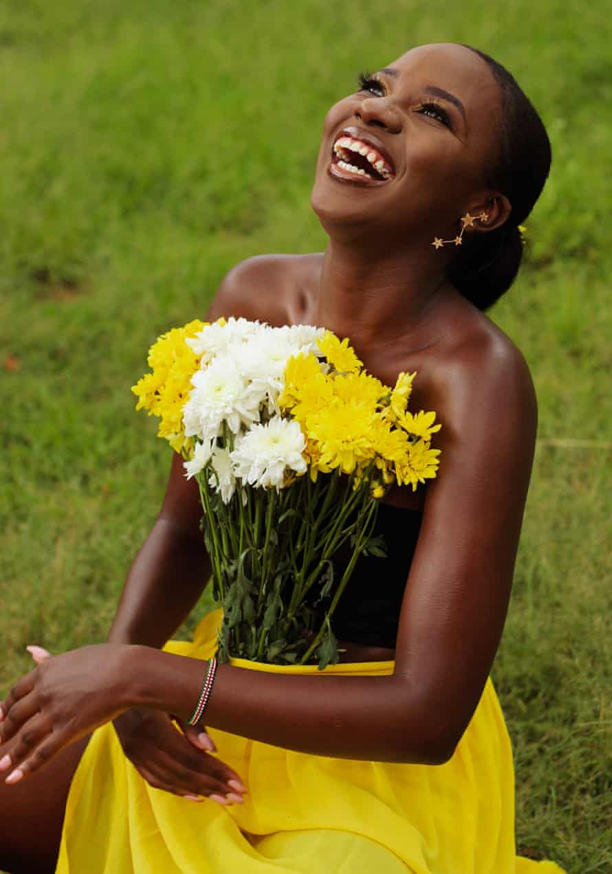 Wanjiku Kaniaru, an endometriosis warrior, laughs in between a photography session to celebrate her recovery from surgery. Wanjiku has decided to live her life out loud and encourage other women living with the condition to live their lives to the best of their abilities.