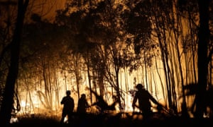 Firefighters battle a blaze in Queensland in November