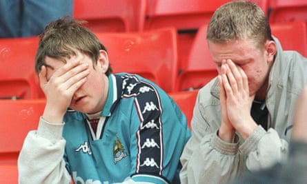 Manchester City fans after watching their team win at Stoke but still get relegated in May 1998.