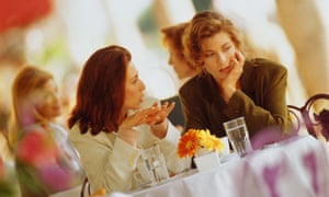 Female friends chatting over lunch