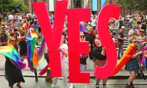 People in the crowd celebrate as the result is announced during the Official Melbourne Postal Survey Result Announcement at the State Library of Victoria on November 15, 2017 in Melbourne, Australia.