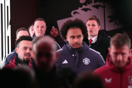 Manchester United’s interim head coach Darren Fletcher (right) alongside coach Jonny Evans (right) in the Turf Moor tunnel ahead of their 2-2 draw at Burnley.