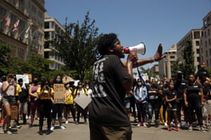 Demonstrators protest near the White House on Sunday.