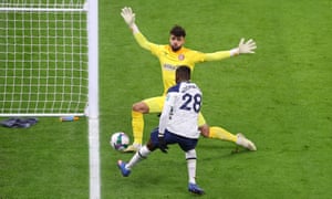 Tottenham Hotspur v Brentford: Carabao Cup semi-final – live! | Football 1 Spurs’ Tanguy NDombèlé sees his shot hit the post as Brentford keeper David Raya attempts to save.