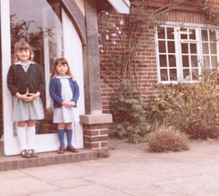 Carr and Bex, shortly before moving to the Netherlands. They are photographed outside a house
