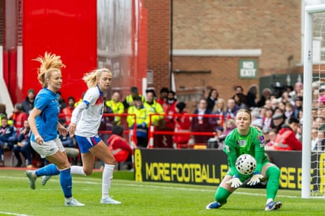 England keeper Hannah Hampton collects the ball from an Iceland free kick.