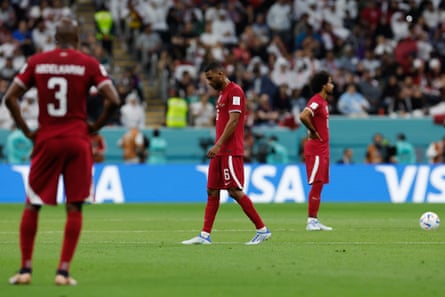 Dejected Qatar players during the opener.