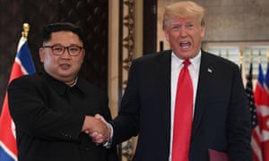 Donald Trump and Kim Jong-un shake hands at the summit on Sentosa island in Singapore on 12 June. 3449.jpg?w=300&q=55&auto=format&usm=12&f