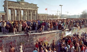 November 1989: Berliners congregate near Brandenburg Gate to celebrate the fall of the wall