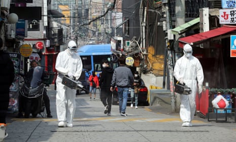 Quarantine workers spray disinfectant in Itaewon neighbourhood