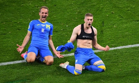 Ukraine’s Artem Dovbyk (right) celebrates scoring the winner against Sweden in their last-16 match.
