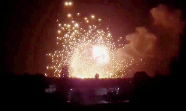 Huge explosion seen over Russian-held ammunition depot near Kherson.