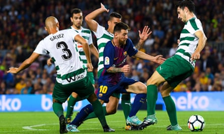 Messi dances through a crowd of Eibar players.