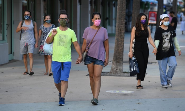 People wear masks in Miami Beach, Florida, 24 July 2020.