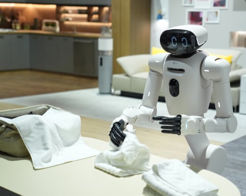 The LG CLOiD robot folds laundry at the LG Electronics booth at CES 2026.