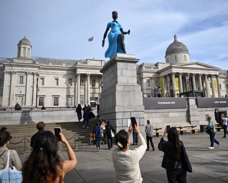 Onlookers admire Lady in Blue.