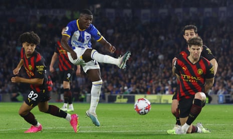Brighton & Hove Albion’s Moises Caicedo shoots at goal but his shot is blocked.