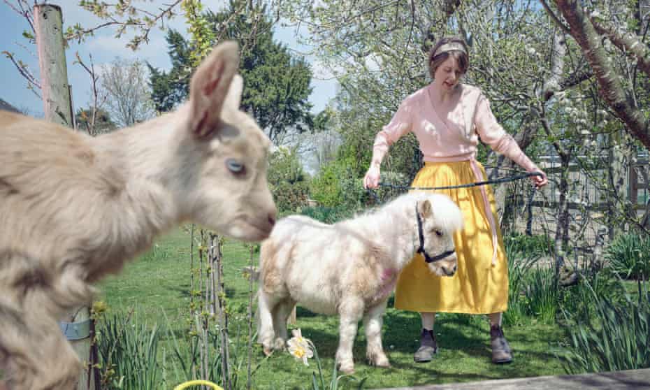 Animal magic: Rebecca Schiller with two of the creatures with whom she shares her smallholding in Kent.