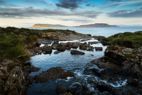A waterfall sits a distance away from the sea, flows along a small gorge to form a still pool with almost infinity aspect out to sea - looking out eastward to the isle of Eigg. This is the smaller lesser known Cuillin ridge on the Isle of Rum.