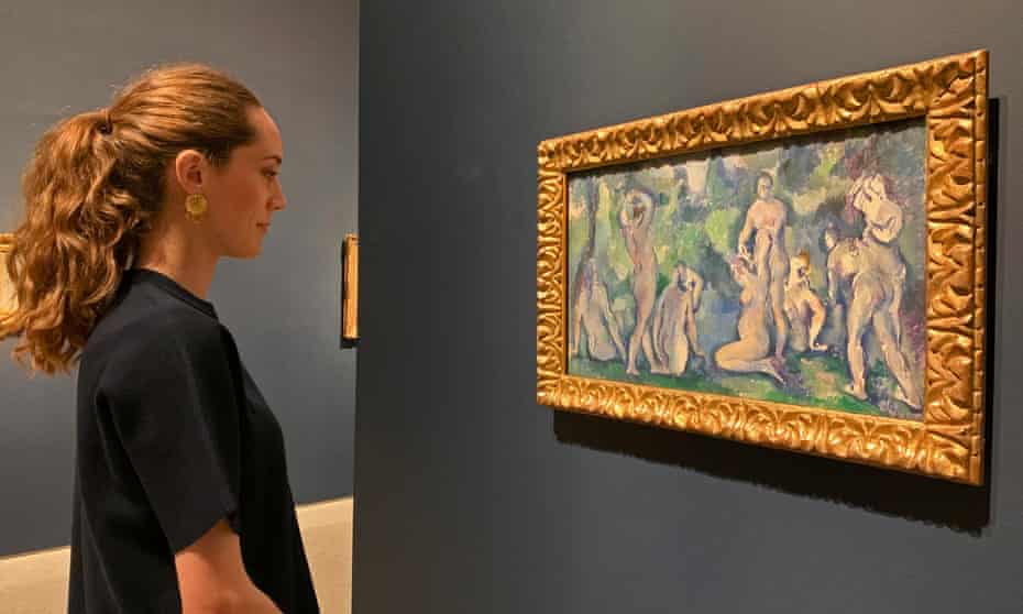 Favourable impressions … curator Anna Ferrari admires a work by Cézanne, part of the collection of Wilhelm Hansen.