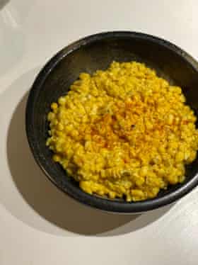 Cook’s Illustrated’s creamed corn uses shallots and thyme to accentuate.