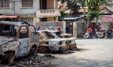 Burned-out cars in the street
