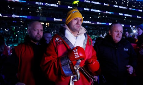Tyson Fury is well wrapped up on a cold night in north London.