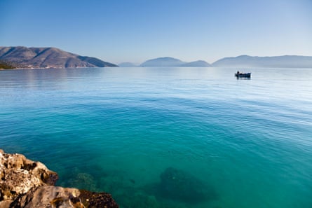 A small boat in the Ionian sea in early morning