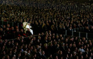 Benedict watches a TV dramatisation of the life of his predecessor, Pope John Paul II, at a Vatican screening in 2005