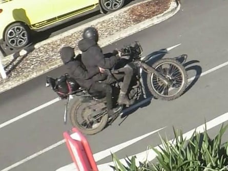 A still photo issued by Waikato police investigating an aggravated robbery in Te Kuiti from May, believed to show Tom Phillips and one of his children.