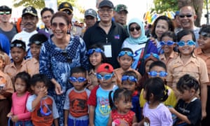 Local children and students on the island of Bangka after receiving their free goggles