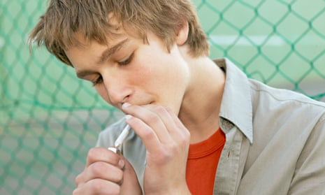 Teenager smoking a joint