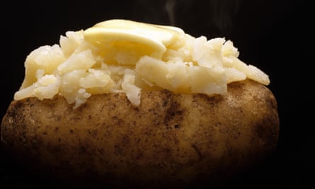 A baked potato with butter